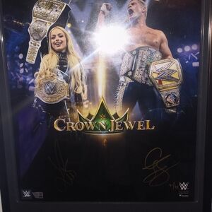 WWE Crown Jewel Poster with Gold and Silver Belts